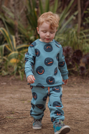 Teal Faces Track Pants