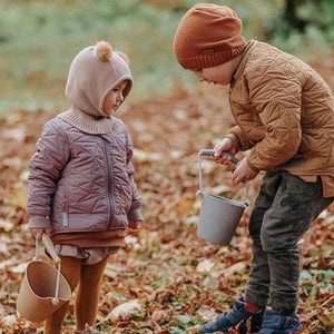 Scrunch Watering Can